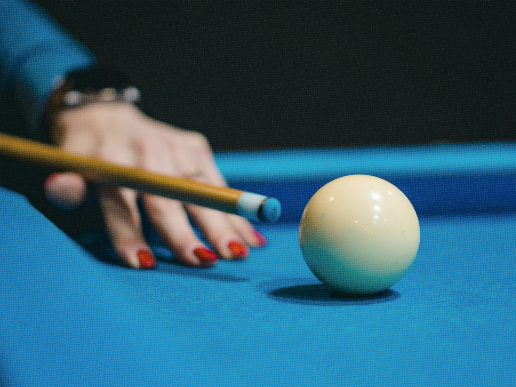 Pool table in a dimly lit bar